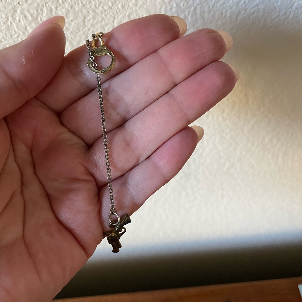 Handcuffs & revolver lariat necklace